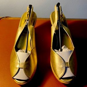 New unused gold platform shoes